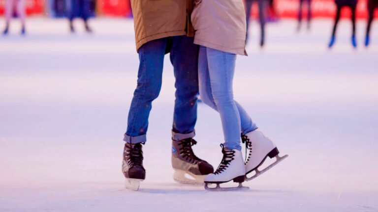 a figure skaterand a hockey player skating