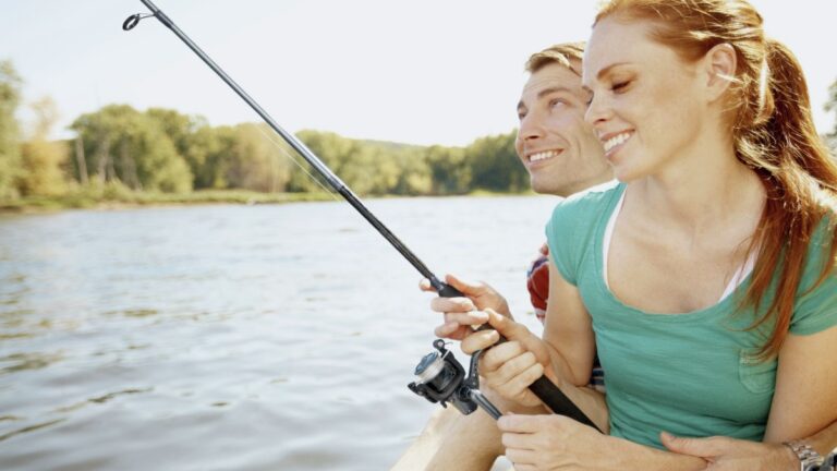 two people in love fishing on a lake